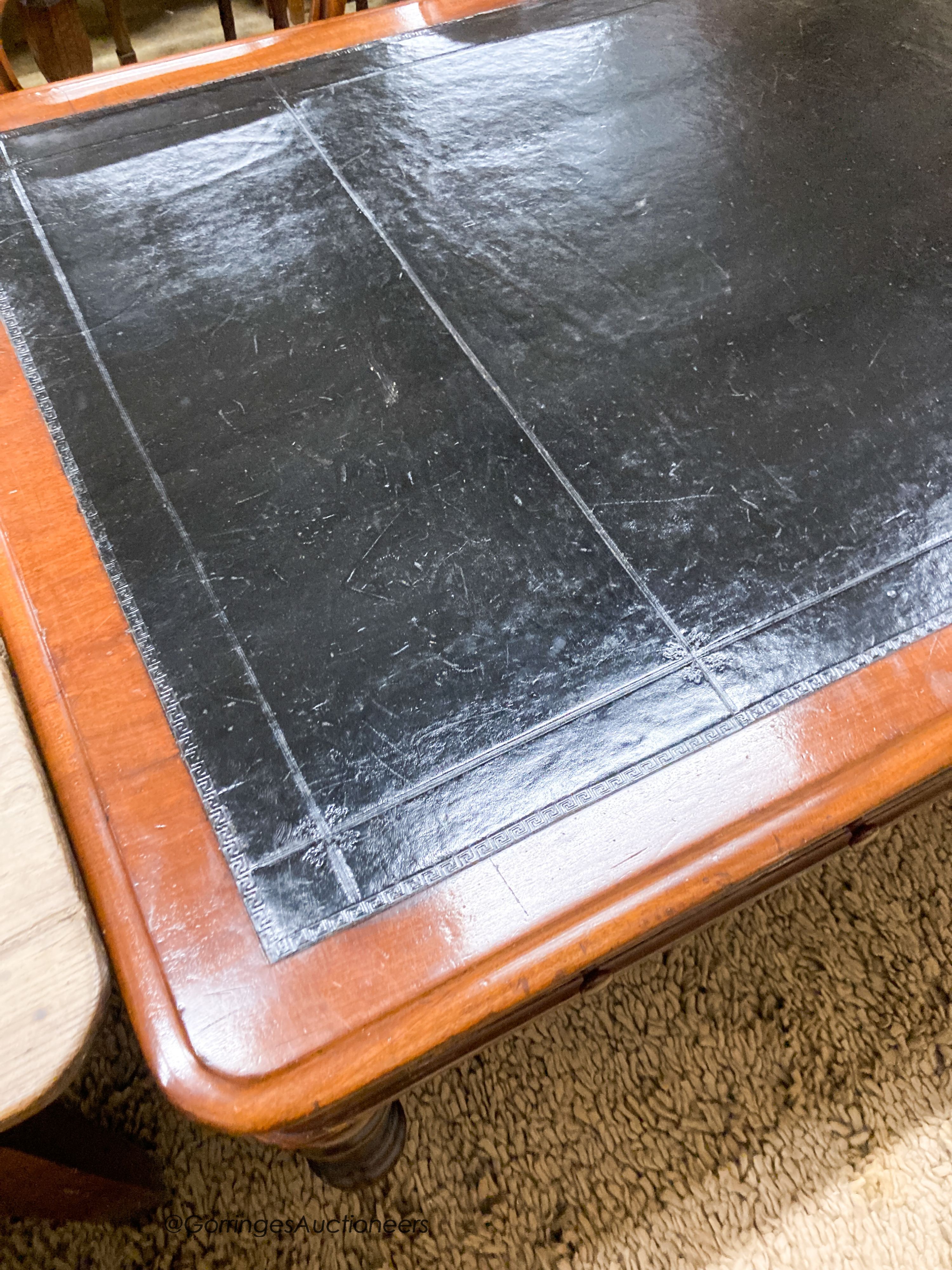 A Victorian mahogany partner's writing table with black leather inset top, length 180cm, depth 102cm, height 72cm